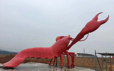 公園擺放的伸著鉗子的玻璃鋼創意小龍蝦雕塑